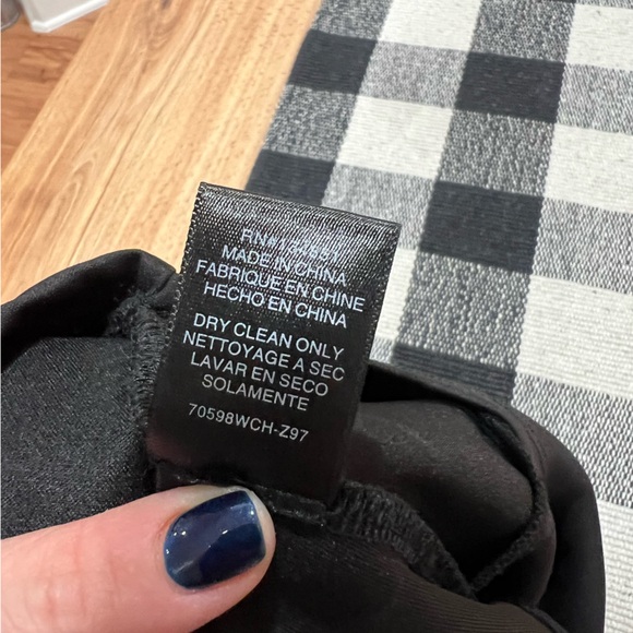 Tight fitting black bodysuit with shape outline detail throughout - Picture 10 of 12